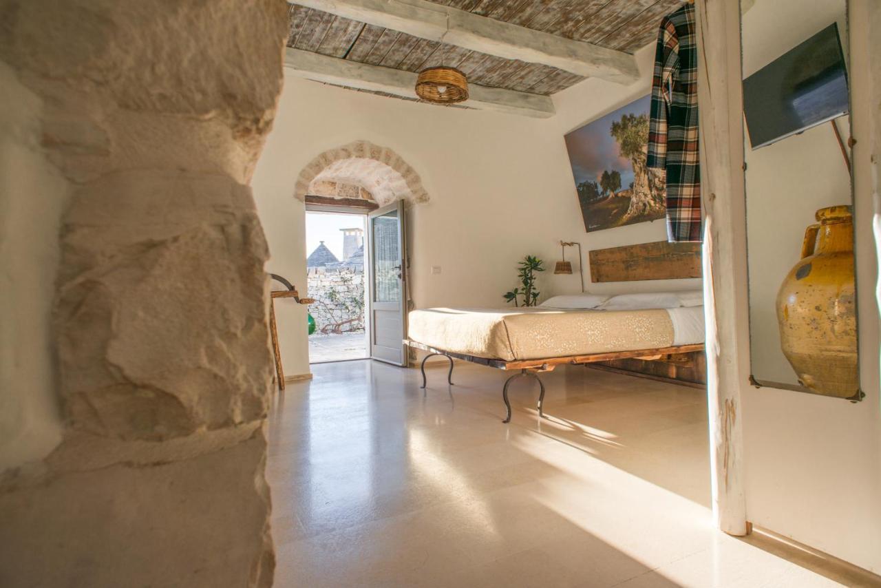 Trulli Holiday Deluxe & Wellness Альберобелло Экстерьер фото