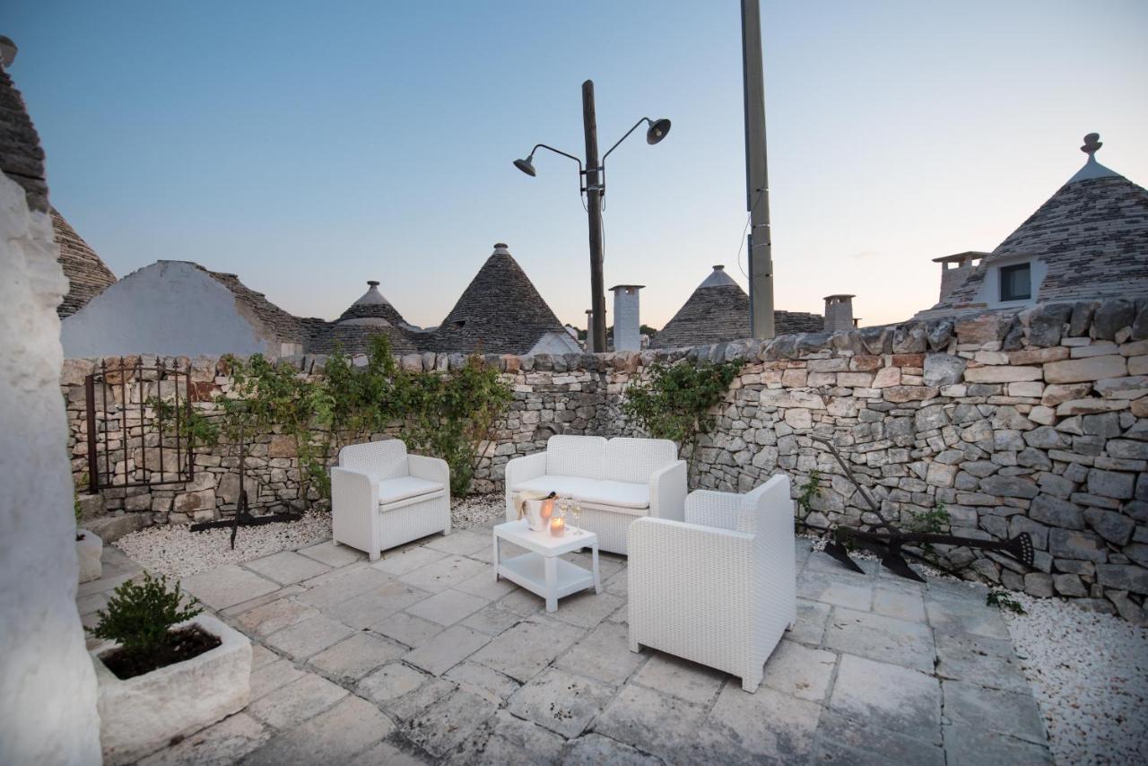 Trulli Holiday Deluxe & Wellness Альберобелло Экстерьер фото